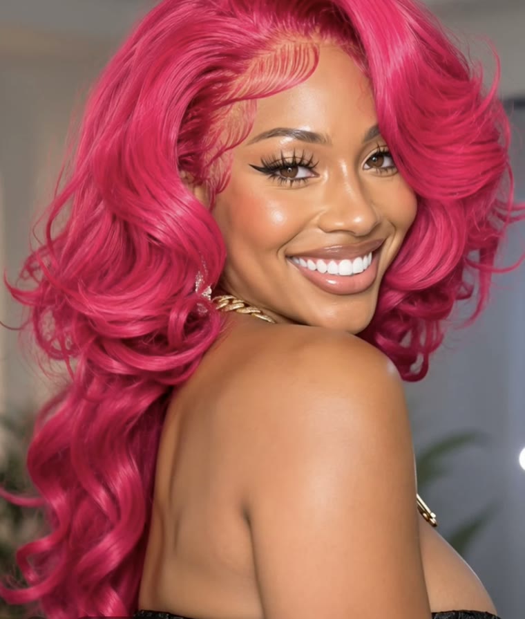 Kelly smiling over her shoulder